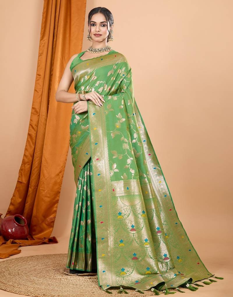 Light green woven self design embellished pure silk banarasi saree with blouse