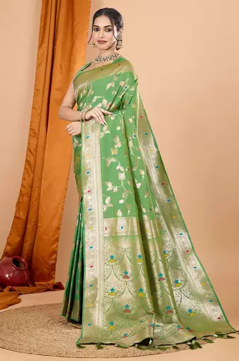 Light green woven self design embellished pure silk banarasi saree with blouse