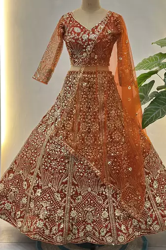 Gorgeous Orange Sequins Net Evening Wear Lehenga Choli With Dupatta