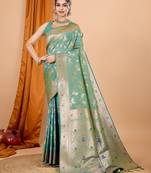 Sea green woven self design embellished pure silk banarasi saree with blouse