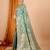 Sea green woven self design embellished pure silk banarasi saree with blouse