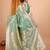 Sea green woven self design embellished pure silk banarasi saree with blouse