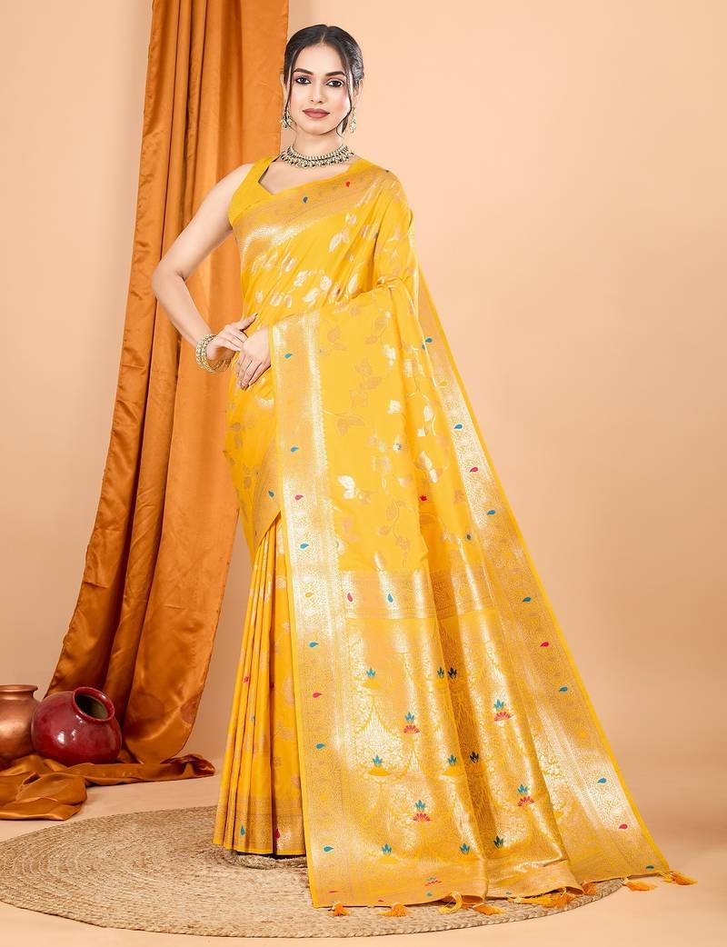 Yellow woven self design embellished pure silk banarasi saree with blouse