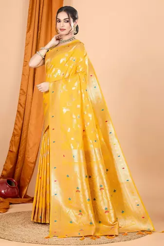 Yellow woven self design embellished pure silk banarasi saree with blouse