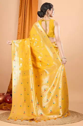Yellow woven self design embellished pure silk banarasi saree with blouse