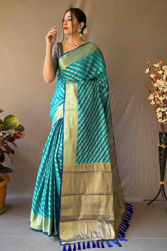 Rama woven self design embellished pure silk banarasi saree with blouse