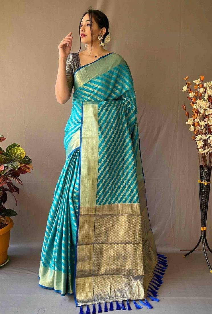 Rama woven self design embellished pure silk banarasi saree with blouse