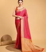 Dark pink woven self design embellished pure silk banarasi saree with blouse