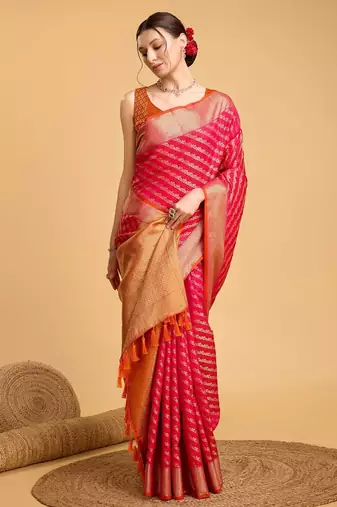 Dark pink woven self design embellished pure silk banarasi saree with blouse