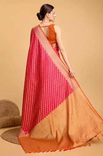 Dark pink woven self design embellished pure silk banarasi saree with blouse