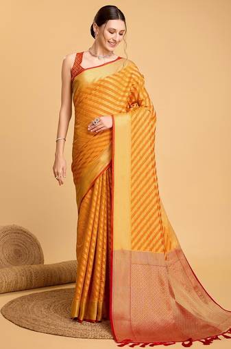 Mustard woven self design embellished pure silk banarasi saree with blouse