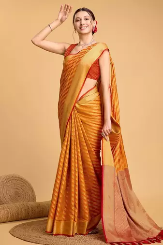 Mustard woven self design embellished pure silk banarasi saree with blouse
