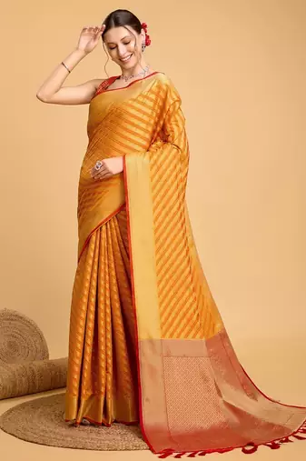 Mustard woven self design embellished pure silk banarasi saree with blouse