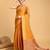 Mustard woven self design embellished pure silk banarasi saree with blouse