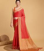 Red woven self design embellished pure silk banarasi saree with blouse