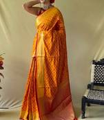 Mustard woven self design embellished pure silk patola saree with blouse