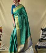 Rama woven self design embellished pure silk patola saree with blouse