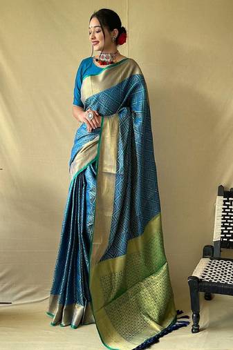 Teal blue woven self design embellished pure silk patola saree with blouse