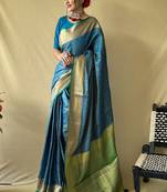 Teal blue woven self design embellished pure silk patola saree with blouse