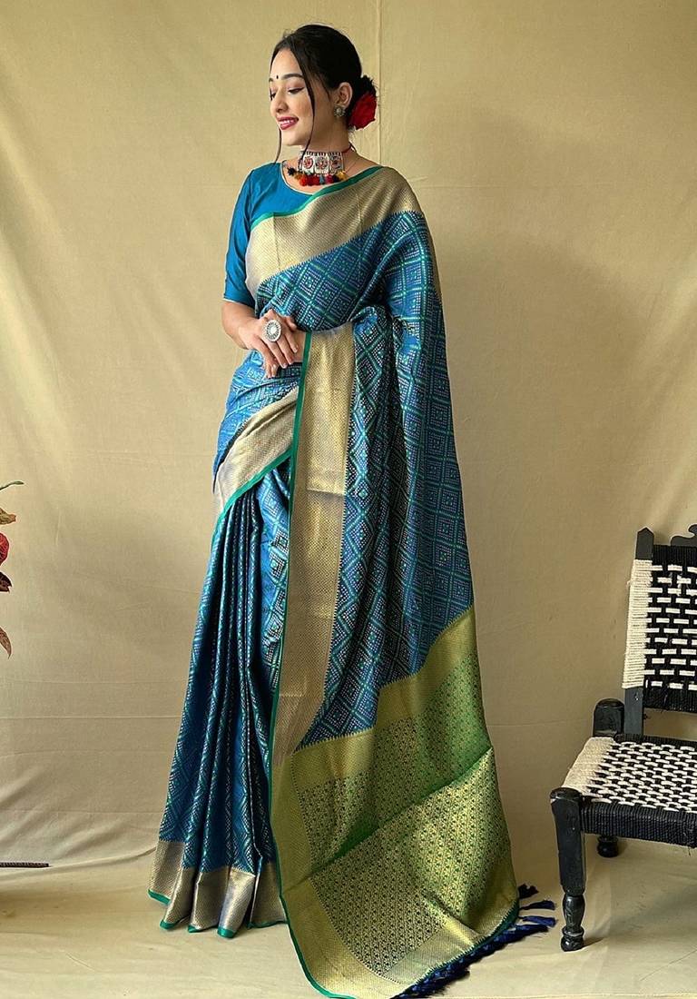 Teal blue woven self design embellished pure silk patola saree with blouse