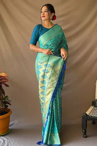Aqua blue woven self design embellished pure silk banarasi saree with blouse