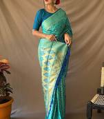 Aqua blue woven self design embellished pure silk banarasi saree with blouse