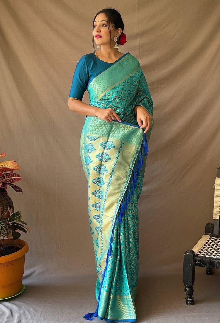 Aqua blue woven self design embellished pure silk banarasi saree with blouse