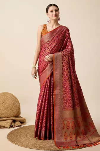 Dark pink woven self design embellished pure silk banarasi saree with blouse