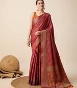 Dark pink woven self design embellished pure silk banarasi saree with blouse