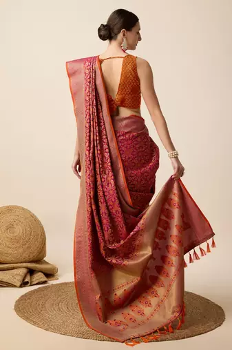 Dark pink woven self design embellished pure silk banarasi saree with blouse
