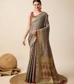 Grey woven self design embellished pure silk banarasi saree with blouse