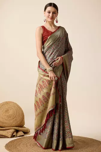Grey woven self design embellished pure silk banarasi saree with blouse