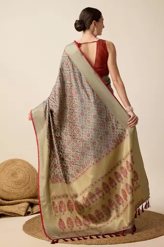 Grey woven self design embellished pure silk banarasi saree with blouse