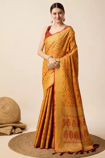 Mustard woven self design embellished pure silk banarasi saree with blouse
