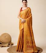 Mustard woven self design embellished pure silk banarasi saree with blouse