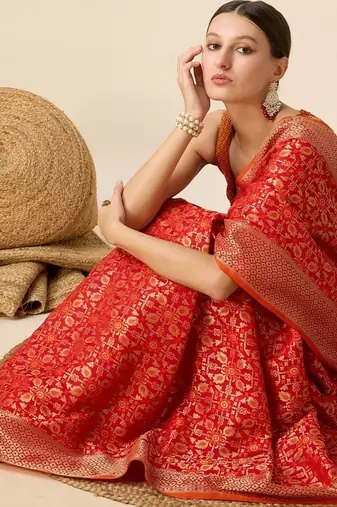Red woven self design embellished pure silk banarasi saree with blouse