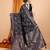 Black woven self design embellished pure silk banarasi saree with blouse