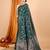 Dark green woven self design embellished pure silk banarasi saree with blouse