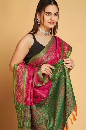 Dark pink woven self design embellished pure silk patola saree with blouse