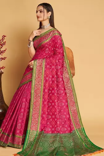 Dark pink woven self design embellished pure silk patola saree with blouse