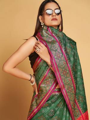 Green woven self design embellished pure silk patola saree with blouse 2