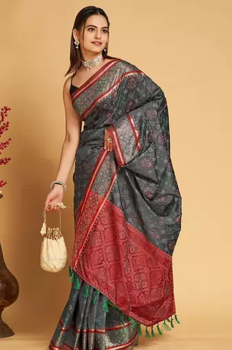 Grey woven self design embellished pure silk patola saree with blouse