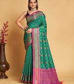 Rama woven self design embellished pure silk patola saree with blouse