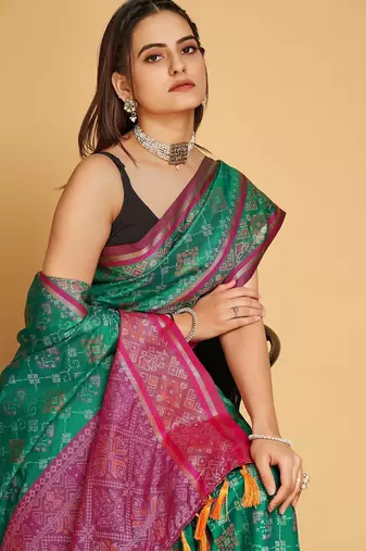 Rama woven self design embellished pure silk patola saree with blouse