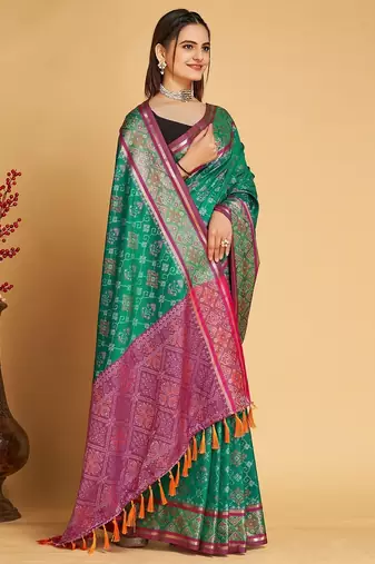 Rama woven self design embellished pure silk patola saree with blouse