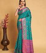 Teal blue woven self design embellished pure silk patola saree with blouse