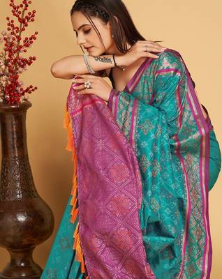 Teal blue woven self design embellished pure silk patola saree with blouse 2