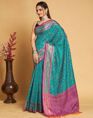 Teal blue woven self design embellished pure silk patola saree with blouse 4