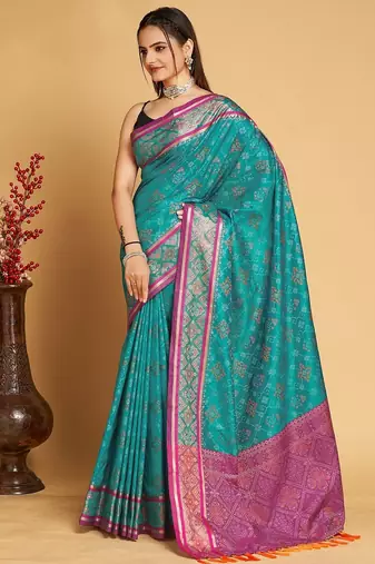 Teal blue woven self design embellished pure silk patola saree with blouse