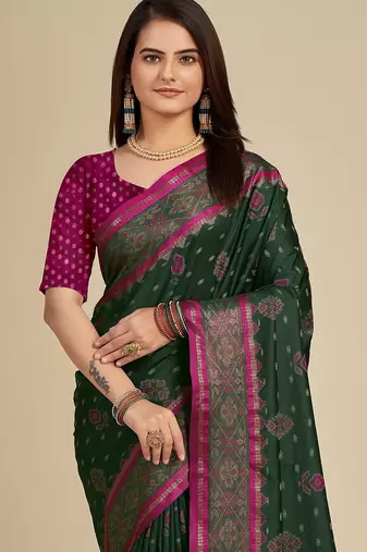Dark green woven self design embellished pure silk patola saree with blouse